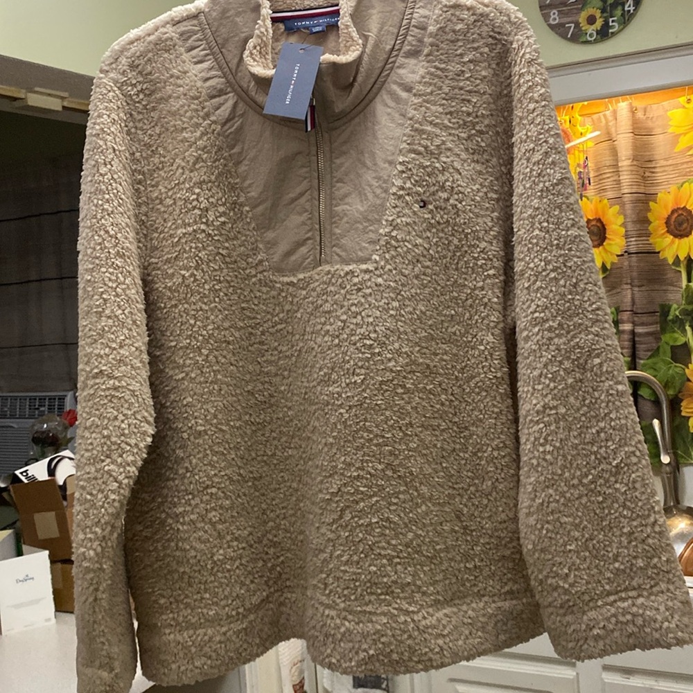 A beige Tommy Hilfiger pullover Sherpa shirt